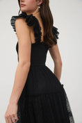 Load image into Gallery viewer, Black dress with ruffled shoulder details on a white background, black midi dress, black dresses near me, shopping Fayetteville ar, boutiques near me