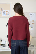 Load image into Gallery viewer, Person wearing a red sweater and blue jeans standing in a boutique in Fayetteville ar, Sweater, sweaters for women, knit sweater, clothing stores in Fayetteville ar