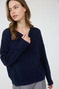 Load image into Gallery viewer, Woman wearing a navy blue sweater against a white background, navy blue sweater, soft navy sweater, navy blue top, blu pepper top, blu pepper sweater, shopping near me, Fayetteville ar boutique store