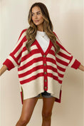 Load image into Gallery viewer, Woman wearing a red and cream striped cardigan in a Fayetteville, ar Botuique store, red and white striped cardigan sweater, red and white cardigan women, red and white cardigan near me, Fayetteville ar stores