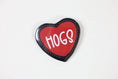 Load image into Gallery viewer, Heart-shaped button with 'HOGS' text on a white background, gameday buttons Arkansas, gameday buttons, near me, red game day pins, red gameday button razorback store near me
