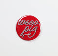 Load image into Gallery viewer, Red button with 'wooo pig' text on a white background, razorback gameday button, razorback gameday pin, red gameday pin, red gameday button, Arkansas gameday pin, Arkansas gameday buttons, razroback stores in Fayetteville ar