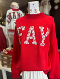 Load image into Gallery viewer, A close-up of the "FAY" lettering and vintage-inspired rose detail on the red Arkansas mock neck sweatshirt at Whimsy Whoo Boutique.