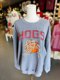 Load image into Gallery viewer, The Hogs Basketball grey crewneck sweatshirt displayed on a mannequin inside Whimsy Whoo Boutique, showing the relaxed fit and bold red graphic.