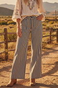 Load image into Gallery viewer, Full front view of the Picnic in the Park striped pants featuring a high-waisted wide-leg fit and classic black and white vertical stripes.