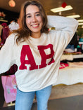 Load image into Gallery viewer, Woman wearing the white AR My Home Arkansas sweatshirt with red "AR" block letters at Whimsy Whoo Boutique in Fayetteville.