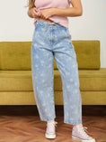 Load image into Gallery viewer, Whimsy Wildflower Drawstring Barrel Jeans featuring a dandelion washed denim pattern.