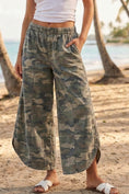 Load image into Gallery viewer, Women’s relaxed fit tulip hem camo pants with washed camo print from Whimsy Whoo Boutique in Fayetteville, Arkansas.