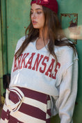 Load image into Gallery viewer, Close-up o crimson ARkansas graphic on a gray French terry oversized women’s sweashirt in whimsy whoo boutique store Fayetteville, ar
