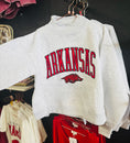 Load image into Gallery viewer, Gray sweatshirt with 'ARKANSAS' text and razorback on a rack in a Fayetteville ar stores, Arkansas mock neck sweatshirt, Arkansas mock neck, arknasas razorback women’s clothing, arknasas razorback boutique clothing, university of Arkansas clothing, H&M
