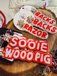 Load image into Gallery viewer, High-quality, officially licensed beaded Arkansas Razorback dangle earrings. A perfect gift idea for any female fan or student to show their school spirit. Available in our online Arkansas Razorback store.
