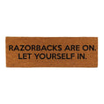 Load image into Gallery viewer, Doormat with text 'RAZORBACKS ARE ON. LET YOURSELF IN.' on a white background
