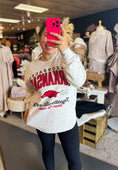 Load image into Gallery viewer, Woman wearing a white Arkansas sweatshirt in a Fayetteville arknasas razorback store, white Arkansas Razorback tshirt, arkansas razorback shirt women, white arkansas razorback shirt women, Arkansas Razorback stores
