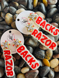 Load image into Gallery viewer, Unique beaded Razorback earrings, meticulously crafted in the official school colors (red and white) for maximum visibility on game day. The perfect, distinctive accessory available at the premier Arkansas Razorback store in Fayetteville.
