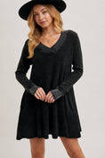 Load image into Gallery viewer, Woman wearing a black dress with long sleeves and a black hat on a plain background, thermal knit dress, waffle knit dress with sleeves, Fayetteville boutiques, clothing stores in Fayetteville ar
