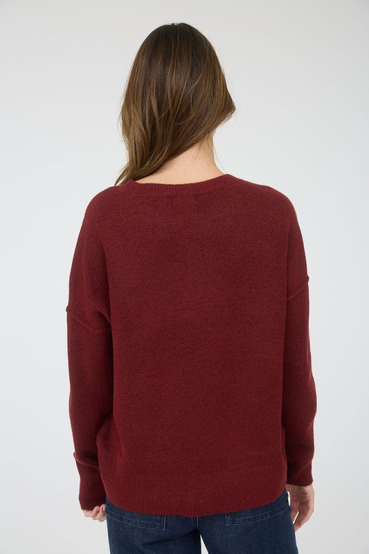 Person wearing a burgundy sweater on a white background,  maroon sweater, soft burgundy sweater,  red top, blu pepper top, blu pepper sweater, shopping near me, Fayetteville ar boutique store