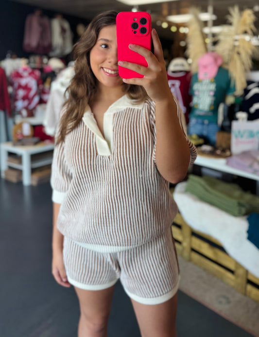 Woman taking a mirror selfie in a clothing store in fayetteville wearing a ribbed matching outfit.  Bibi matching outfit,  sweater matching set for women, fall matching set for women, Fayetteville ar clothing store