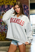 Load image into Gallery viewer, Women’s oversized gray Arkansas sweatshirt with crimson Arkansas graphic, front view, razorback game day apparel. Whimsy Whoo boutique store Fayetteville, AR
