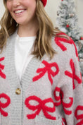 Load image into Gallery viewer, Wrapped up Warm in a Bow Cardigan
