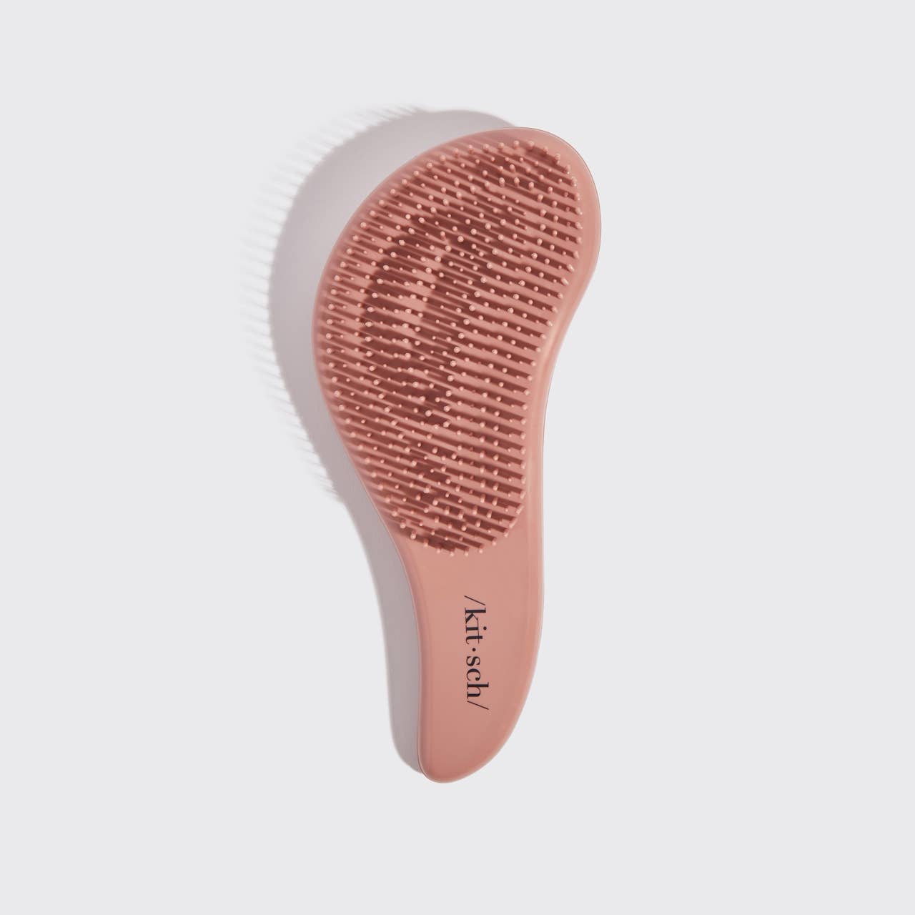 Kitsch terracotta detangler hair brush at Whimsy Whoo boutique store, a top-rated boutique in Fayetteville Arkansas for trendy hair accessories