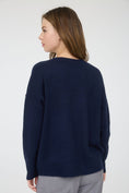 Load image into Gallery viewer, Woman wearing a navy blue sweater against a white background, navy blue sweater, soft navy sweater, navy blue top, blu pepper top, blu pepper sweater, shopping near me, Fayetteville ar boutique store
