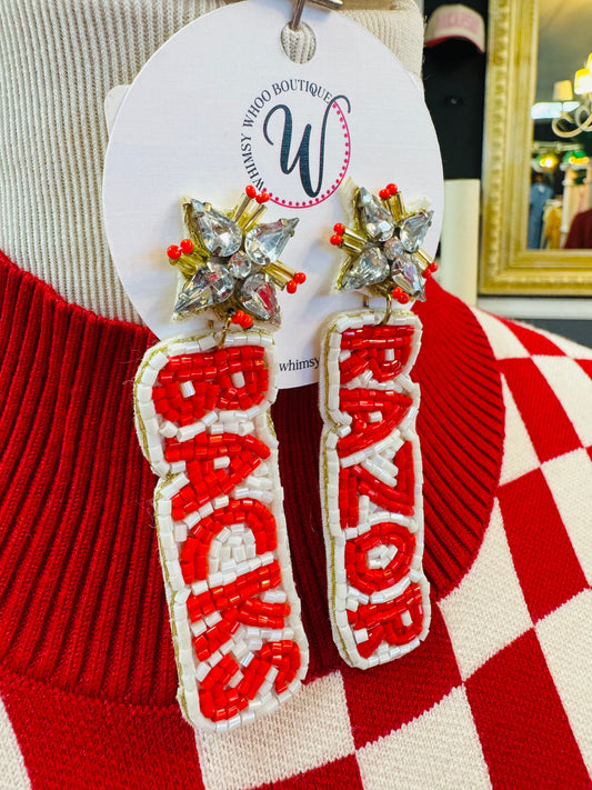 Detailed image of handcrafted beaded earrings featuring the Arkansas Razorback mascot logo. The earrings are made with red, white, and black seed beads, perfect for women to wear on game day or as daily Arkansas Razorback jewelry.