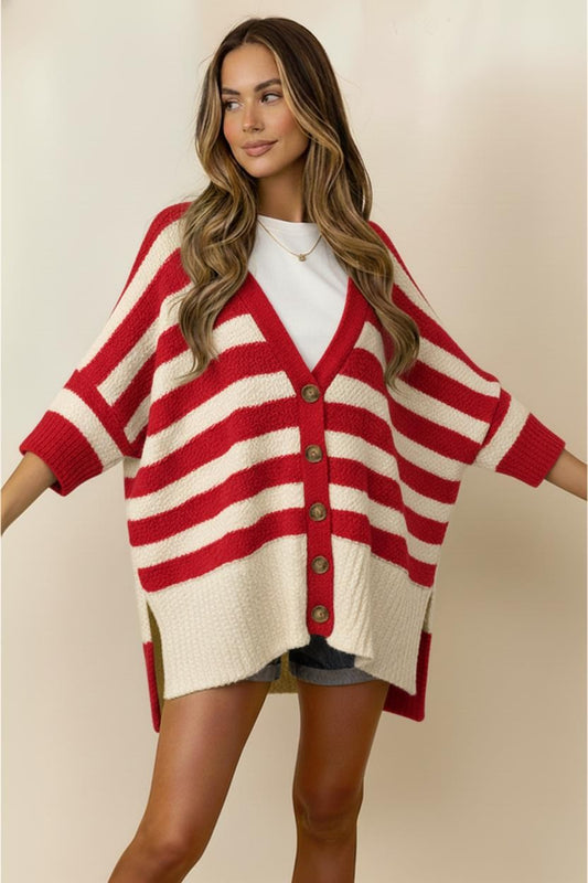 Woman wearing a red and cream striped cardigan in a Fayetteville, ar Botuique store, red and white striped cardigan sweater, red and white cardigan women, red and white cardigan near me, Fayetteville ar stores