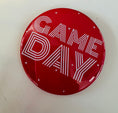 Load image into Gallery viewer, Red button with 'GAME DAY' text on a white background, red game day pins, red gameday button, college game day pins
