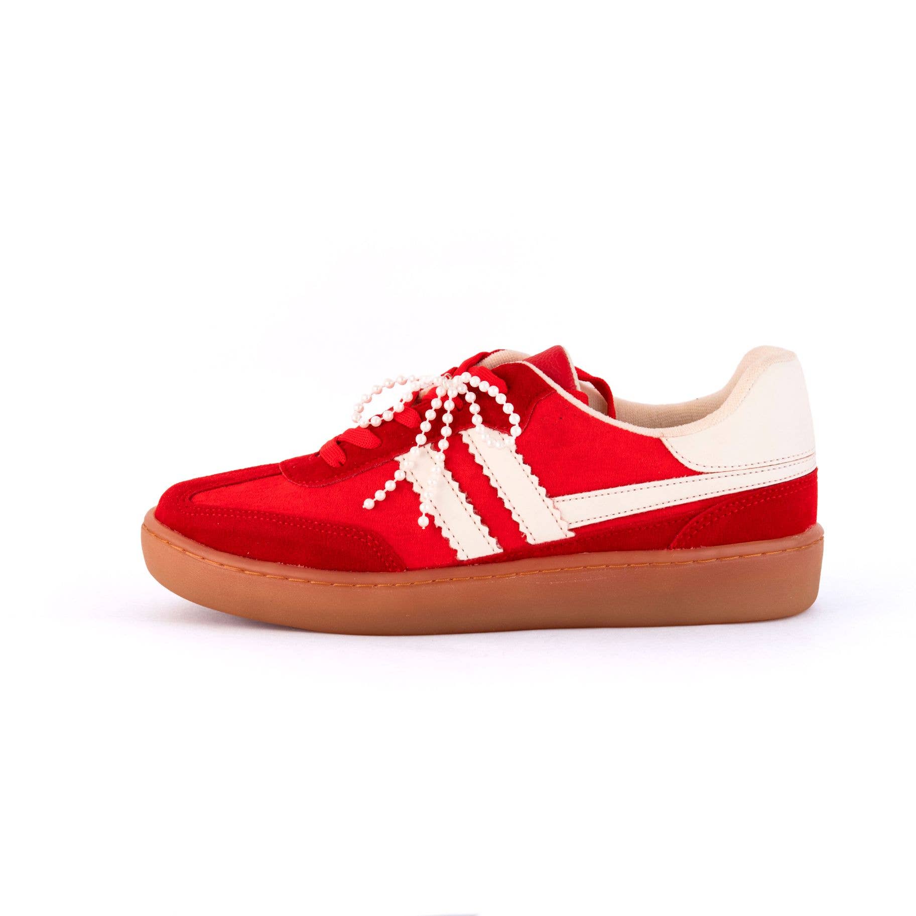 Red sneaker with white laces and brown sole on a white background, red sneakers, maker shoes red sneakers, red gameday shoe, red shoes, shoe store Fayetteville, ar shopping