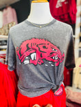 Load image into Gallery viewer, Gray t-shirt with a red Arkansas Razorback logo on a mannequin in a store setting.  Vintage razorback shirt, slobbering hog tee, Arkansas shirts near me, Fayetteville mall
