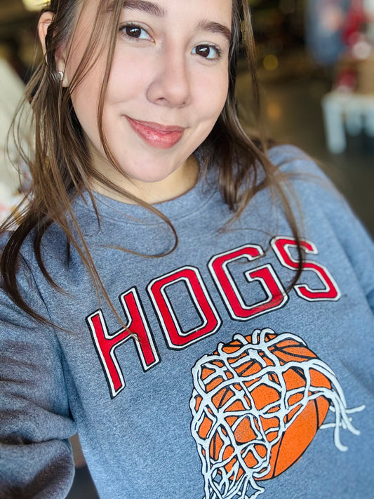 A smiling selfie featuring the Hogs Basketball grey crewneck sweatshirt at Whimsy Whoo Boutique in Fayetteville.