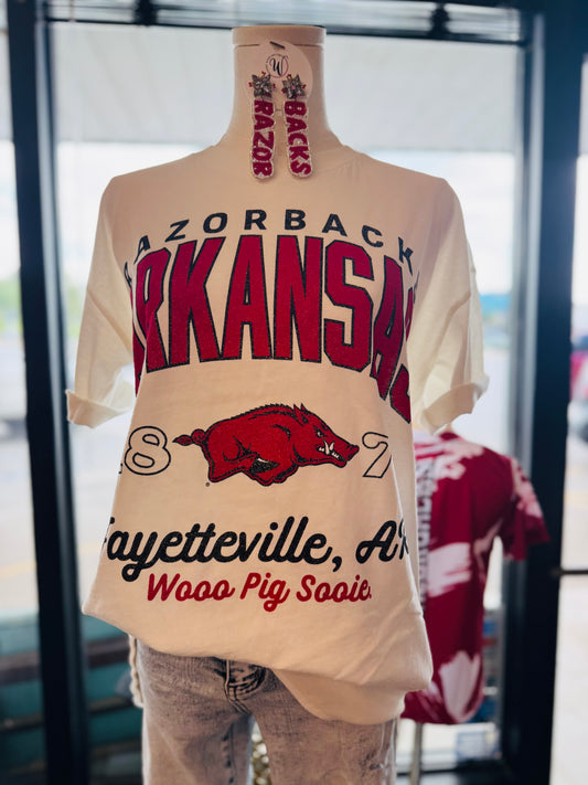Mannequin wearing a white razorback tshirt, razorback store near me, razorback store Fayetteville, AR, white Razorback tshirt for women, women’s razorback tees, AR Razorback apparel
