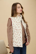 Load image into Gallery viewer, Woman wearing a brown jacket with a floral patterned inner lining against a beige background Floral vest, floral vest zara, floral vest top, floral vest puffer, floral vest women’s, vintage floral vest
