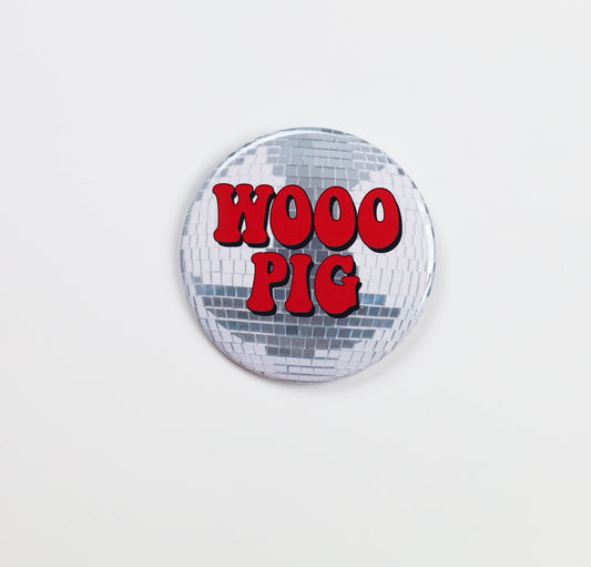 Discoball button with 'WOOO PIG' text on a white background, tailgate pins, tailgate buttons, gameday pin, gameday button, boutiques within 5 miles