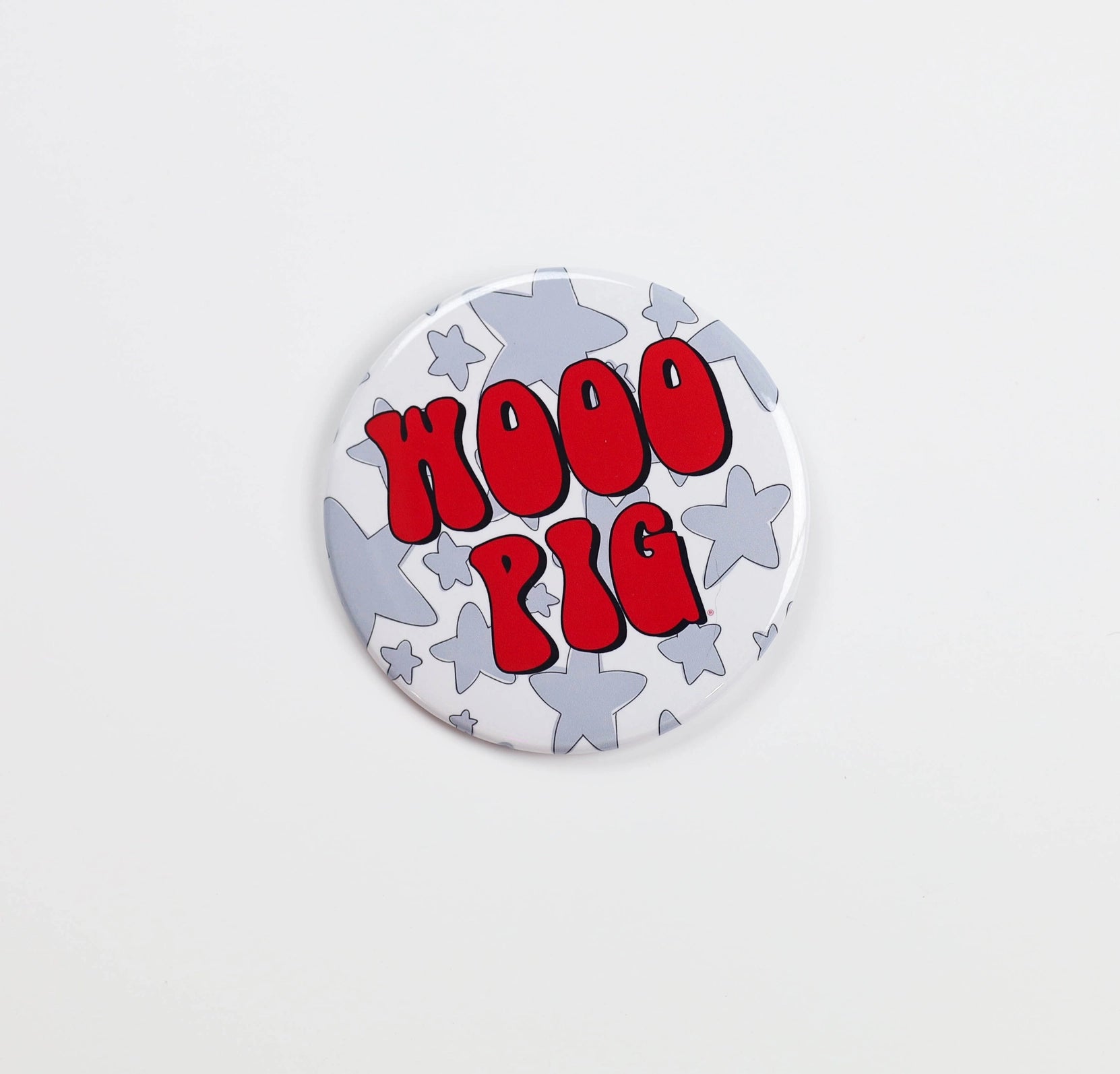 Button badge with 'WOOO PIG' text on a white background, razroback gameday button, gameday buttons, college game day pins, razorback store near me, razorback store online