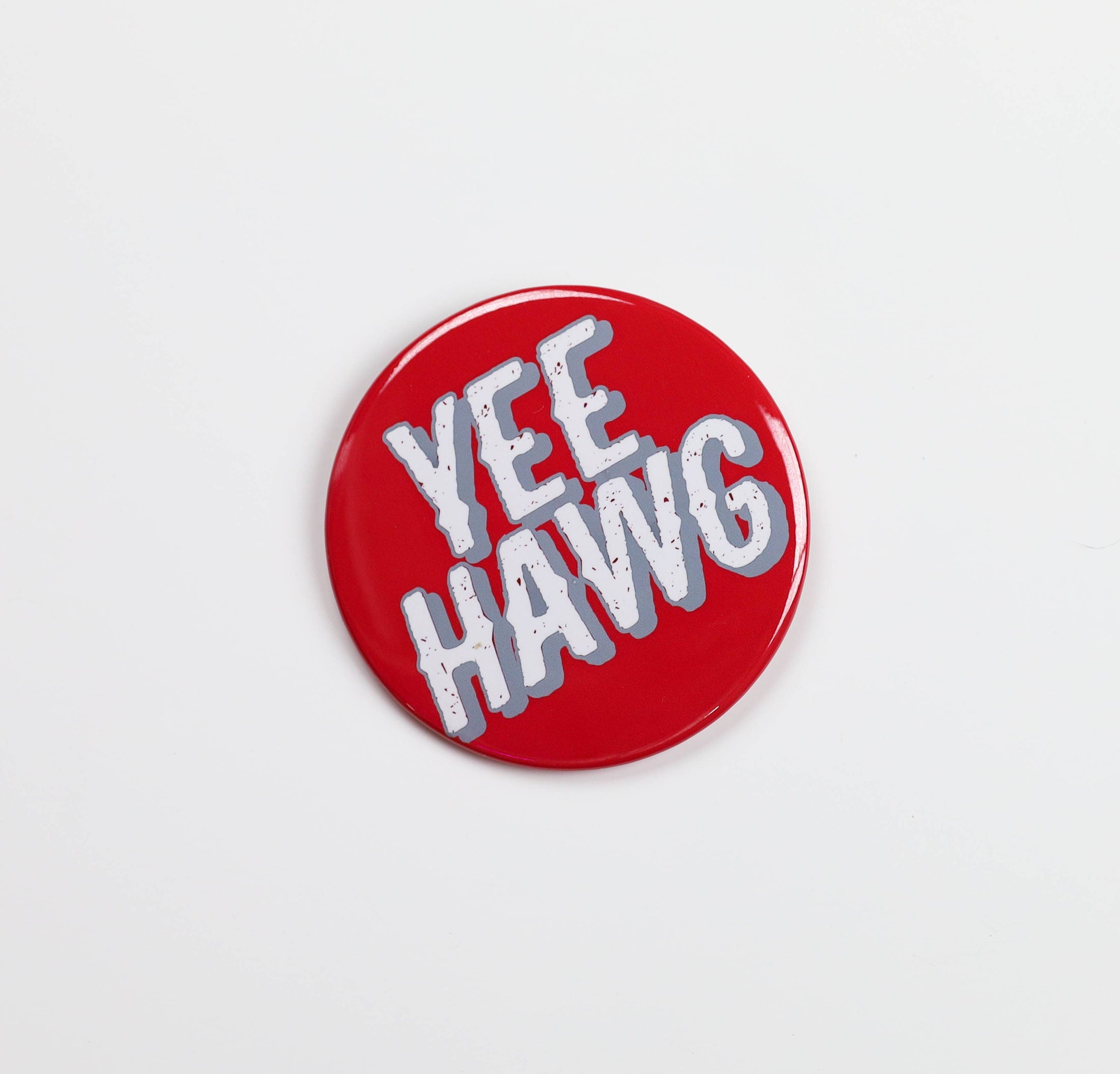 Red button with 'YEE HAWG' text on a light gray background, Yee hawg gameday button, hogs gameday button, yeehaw gameday, pin hogs gameday pin, gameday pins near me