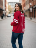 Load image into Gallery viewer, The A Cut Above Arkansas Razorback Boutique Sweater, a high-quality red knit pullover with white Fayetteville lettering, available at Whimsy Whoo.
