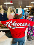 Load image into Gallery viewer, Woman wearing oversized Arkansas Razorback tee styled as a casual game day outfit from Whimsy Whoo boutique in Fayetteville Arkansas.

