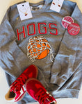 Load image into Gallery viewer, A styled gameday flat lay featuring the Hogs Basketball sweatshirt, denim shorts, red sneakers, and "Woo Pig" accessories from Whimsy Whoo Boutique.
