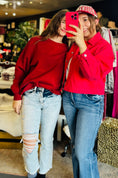 Load image into Gallery viewer, Two women modeling gameday outfits at Whimsy Store, an Arkansas Razorback store in Fayetteville AR, featuring the red Charming Stitch embroidery jacket and a custom Razorback hat.
