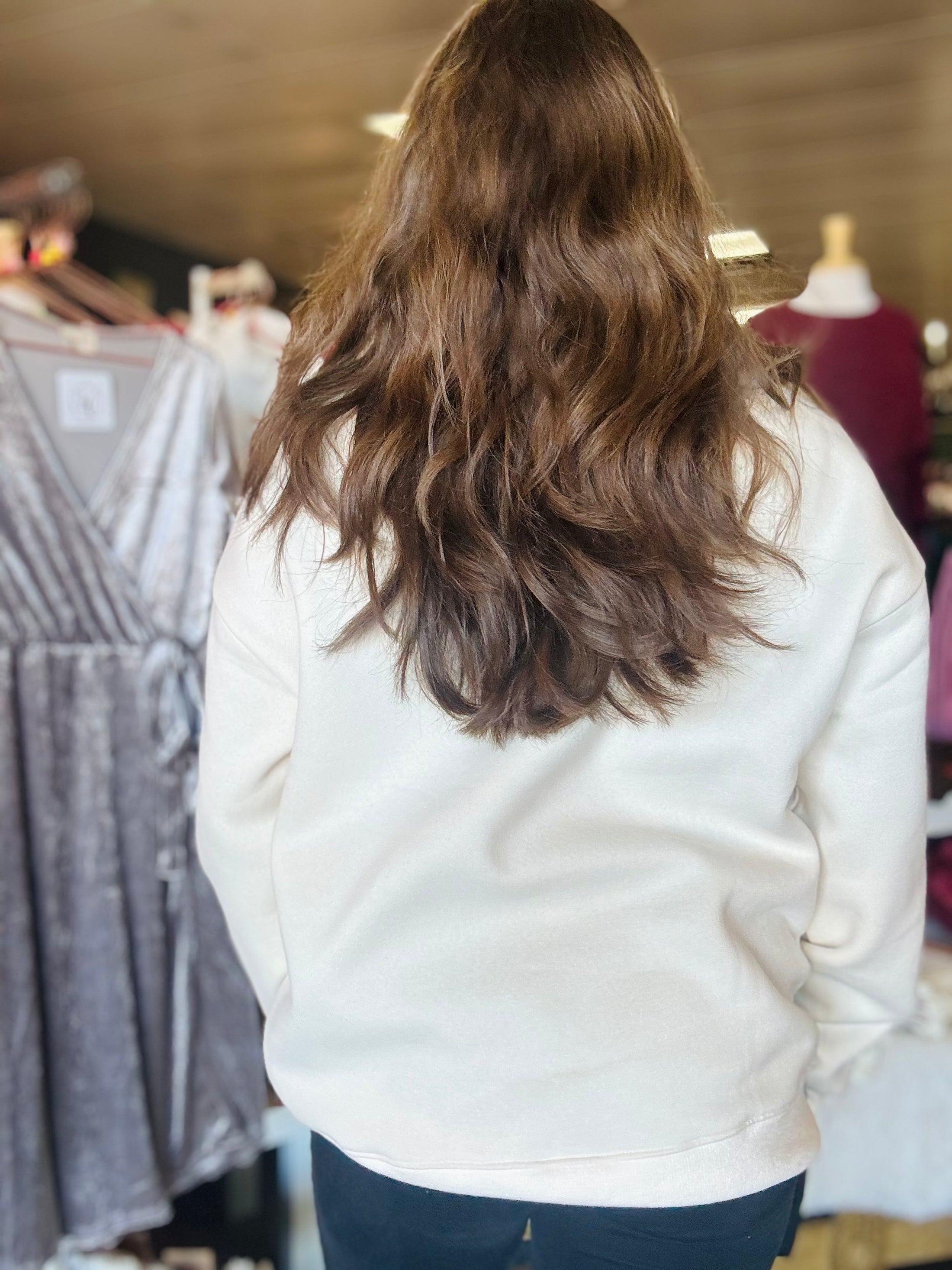 Back view of the cream mock neck sweatshirt, showing the comfortable fit and clean design for Arkansas Razorback fans.