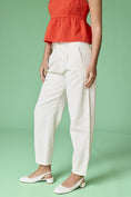 Load image into Gallery viewer, A close-up side view of the Executive Edge Barrel Pants showing the deep side pocket and crisp off-white twill material.
