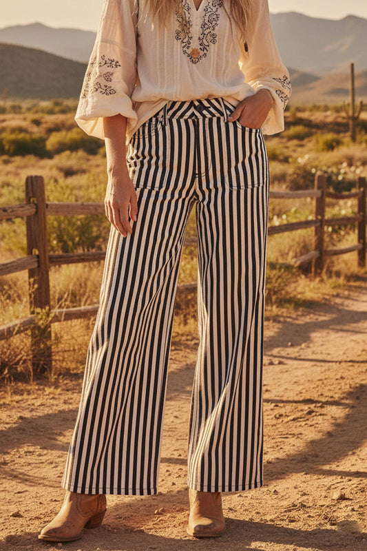 Full front view of the Picnic in the Park striped pants featuring a high-waisted wide-leg fit and classic black and white vertical stripes.
