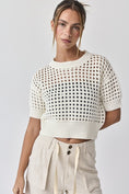 Load image into Gallery viewer, A trendy spring outfit featuring the white Oh Hey Crochet! open-knit sweater, a versatile layering piece available at Whimsy Whoo Boutique in Fayetteville.

