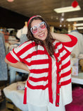 Load image into Gallery viewer, An angled shot of the red and white striped oversized cardigan, perfect for spring transition and repping the Hogs at Whimsy Whoo Boutique.
