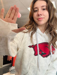 Load image into Gallery viewer, Person wearing a camo hoodie with a red Hog/Razorback logo, standing in Whimsy Whoo Boutique located in Johnson, Arkansas.
