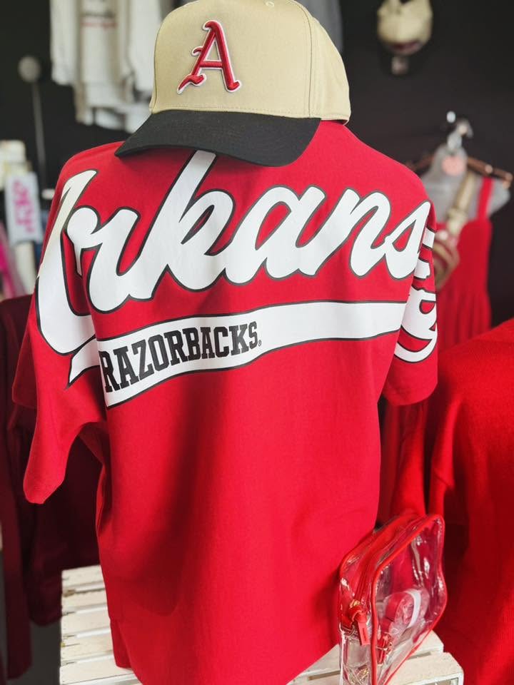 Oversized Woo Pig Arkansas Razorback tee styled with boots for SEC football weekends and University of Arkansas game day apparel.
