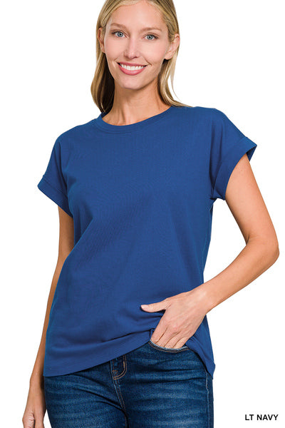 A woman wearing a navy blue cuffed tee with short sleeves, paired with blue jeans in a Fayetteville ar boutique store. Zenana Basic Babe Cuffed Tee in a deep Navy Blue, featuring a classic crew neck and fixed rolled sleeves. Fayetteville ar boutiques, Fayetteville Arkansas boutiques stores